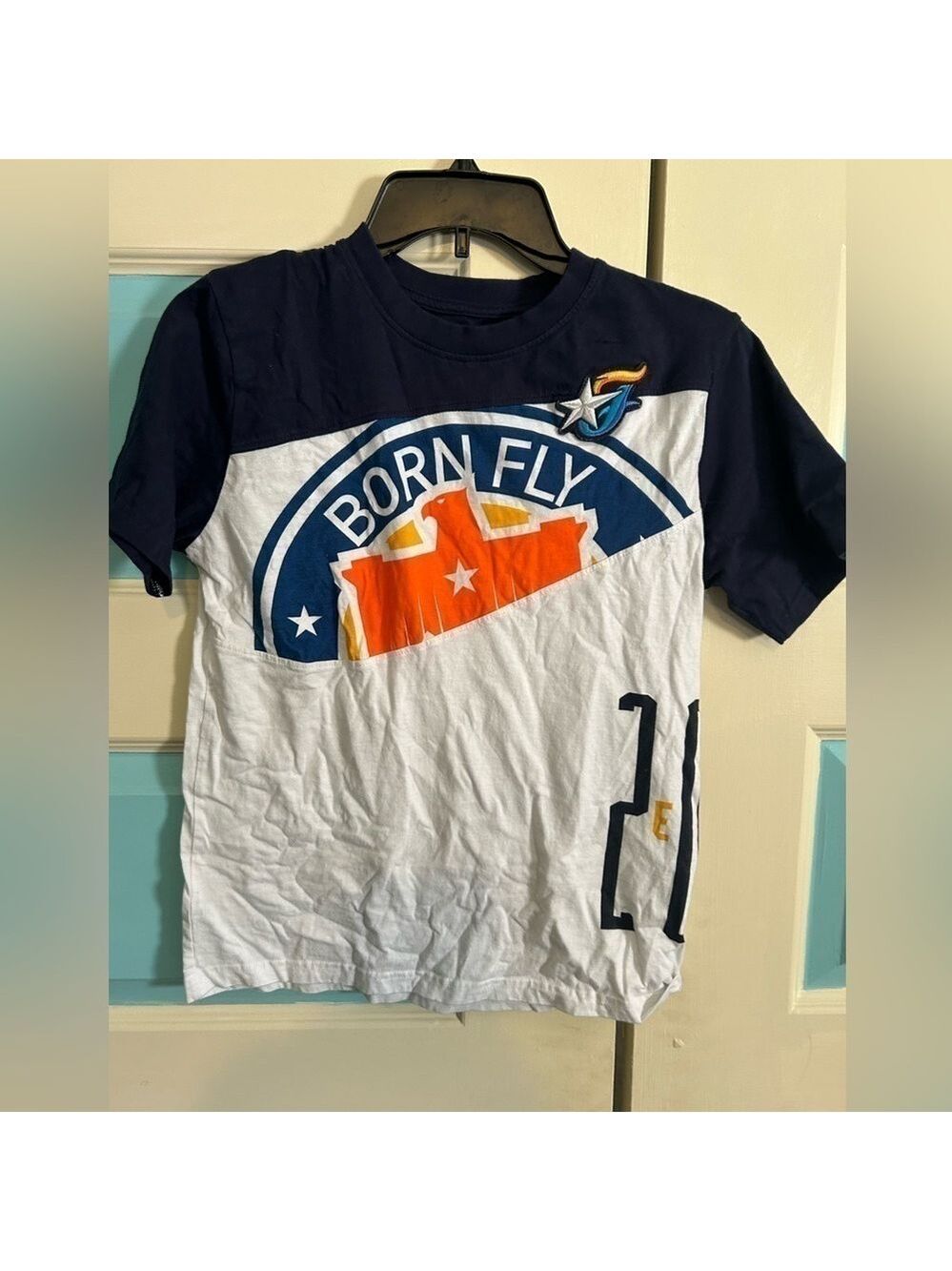 Born fly short sleeve top
